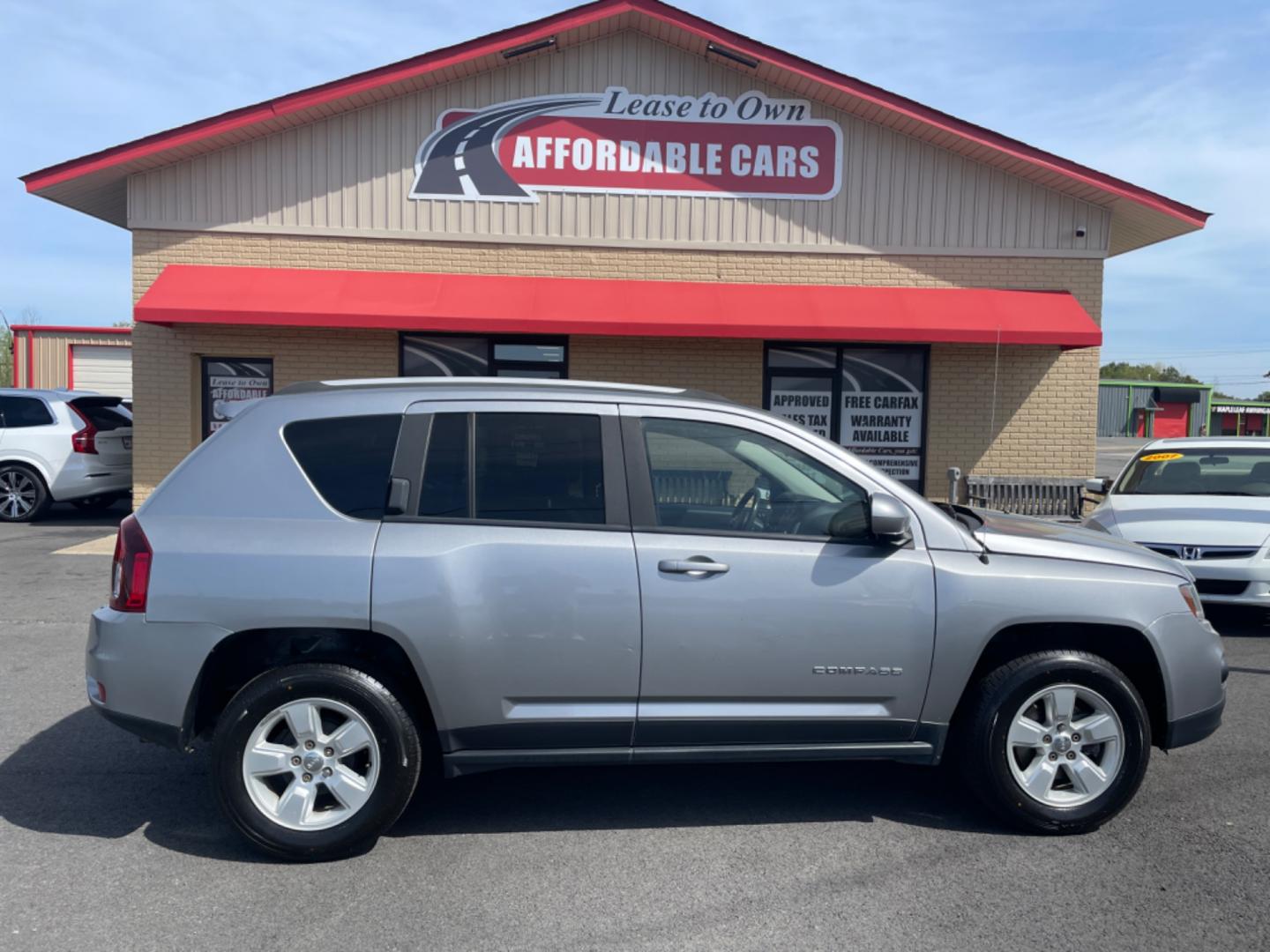 2016 Silver Jeep Compass (1C4NJCEA4GD) with an 4-Cyl, 2.0 Liter engine, Automatic, CVT transmission, located at 8008 Warden Rd, Sherwood, AR, 72120, (501) 801-6100, 34.830078, -92.186684 - Photo#0